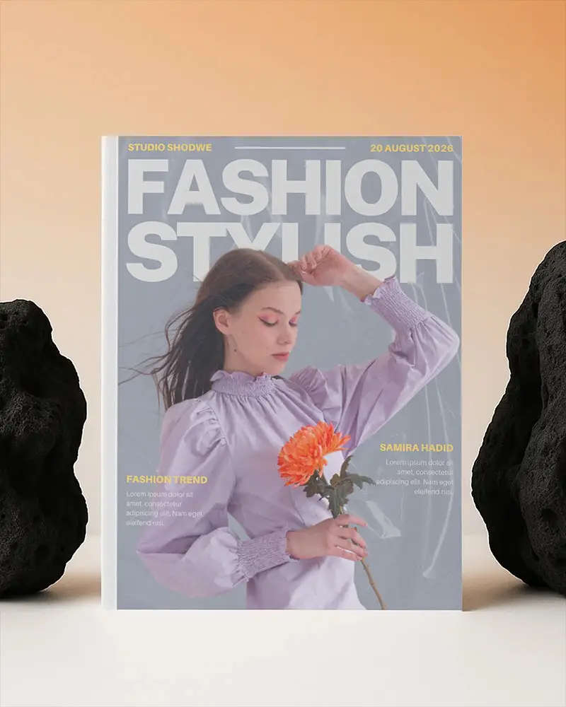 Upright Magazine Mockup On Light Surface Between Volcanic Rocks With Soft Gradient Orange Background 0232