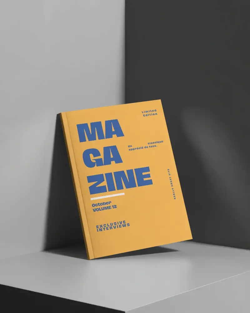 Monochrome Shadow Lit Magazine Mockup Upright On Dual Toned Modern Surface