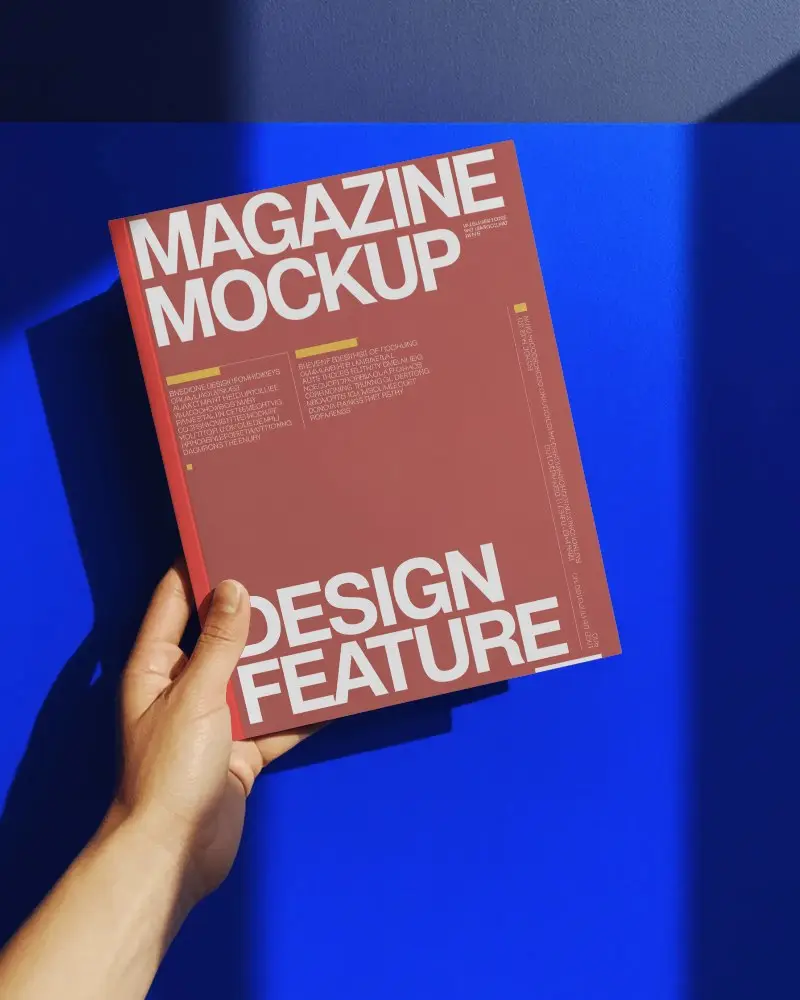 hand-holding-magazine-mockup-for-creative-cover-design-presentation