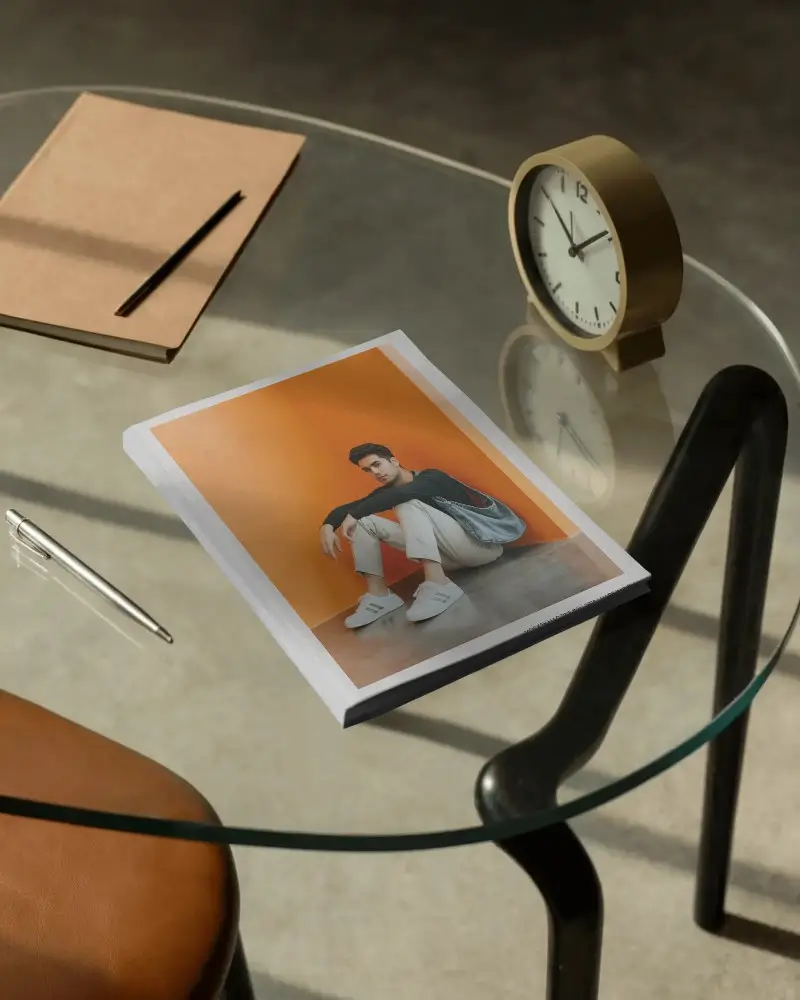 modern-glass-table-with-minimalist-magazine-mockup-and-office-accessories-arrangement