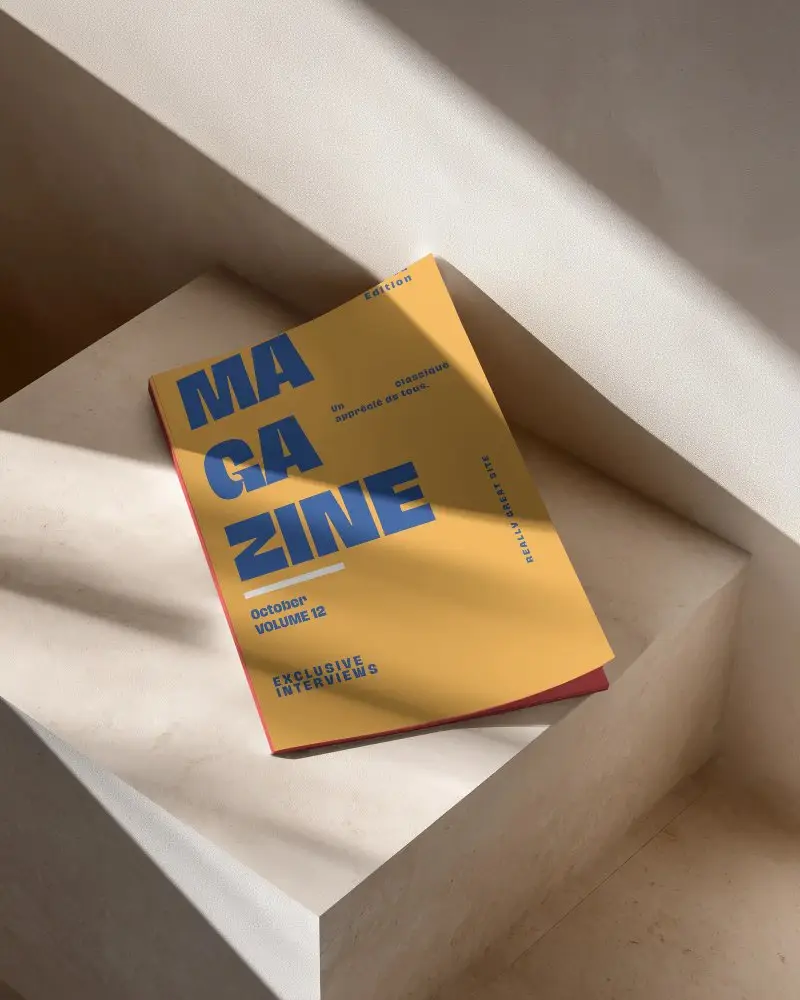 Photorealistic Minimalist Magazine Mockup On Sleek Stone Surface With Natural Light