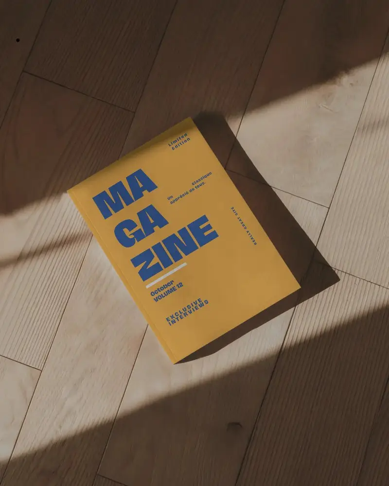 Sleek Modern Magazine Mockup On Light Wooden Floor With Natural Sunlight Shadows