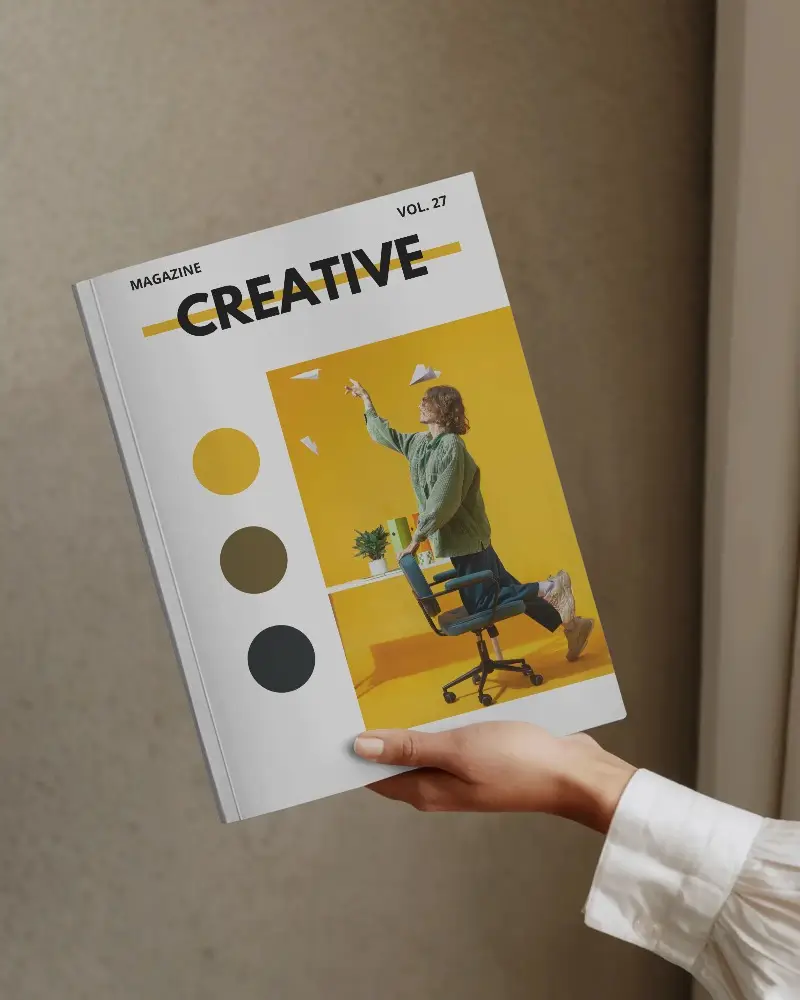 Hand Holding Minimalist Hardcover Magazine Mockup For Clean Brand Presentations