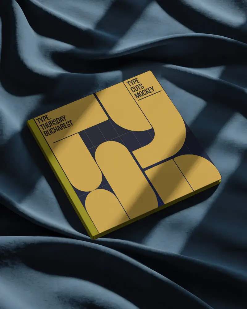 Sleek Minimalist Magazine Mockup On Soft Fabric With Natural Light Shadows