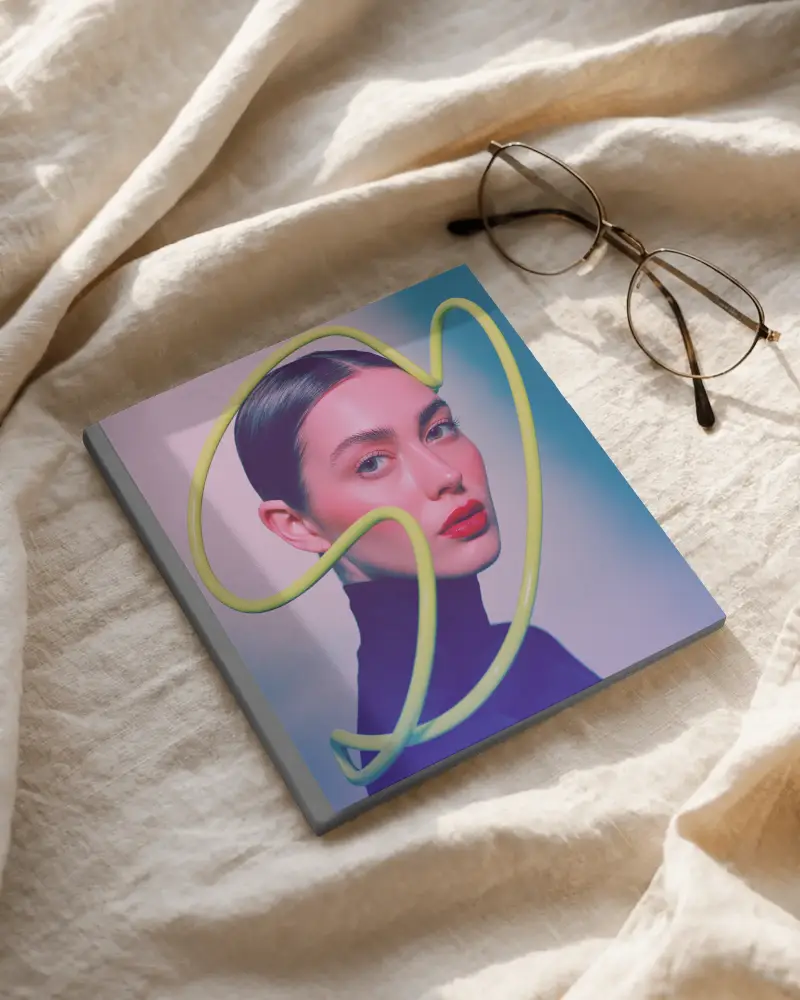 Minimalistic Square Magazine Mockup With Folded Fabric And Reading Glasses For Design