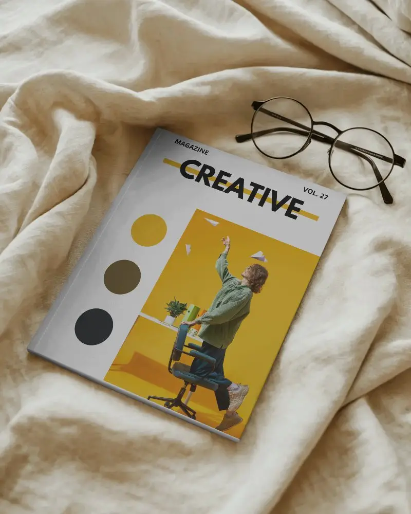 Realistic Magazine Mockup Flat Lay On Crumpled Textile With Eyewear For Design Presentation