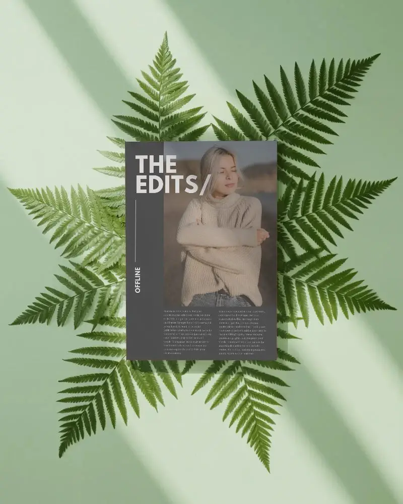 Flat Lay Magazine Mockup On Green Leaf Arrangement For Sustainable Marketing Campaigns