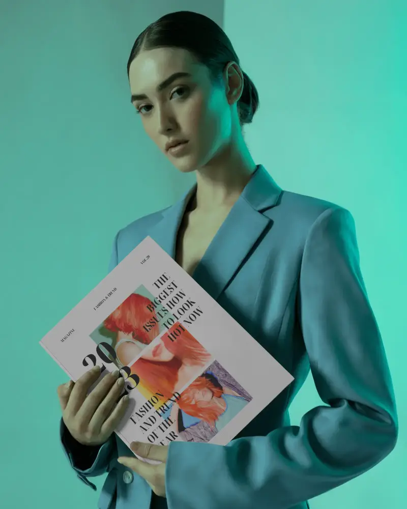 Teal Lit Fashion Portrait Magazine Mockup Held By Model Minimal Editorial Presentation