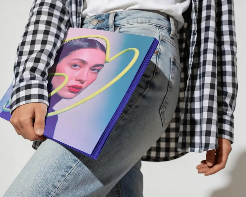 Casual Style Model Holding Clean Cover Magazine Mockup For Brand Promo