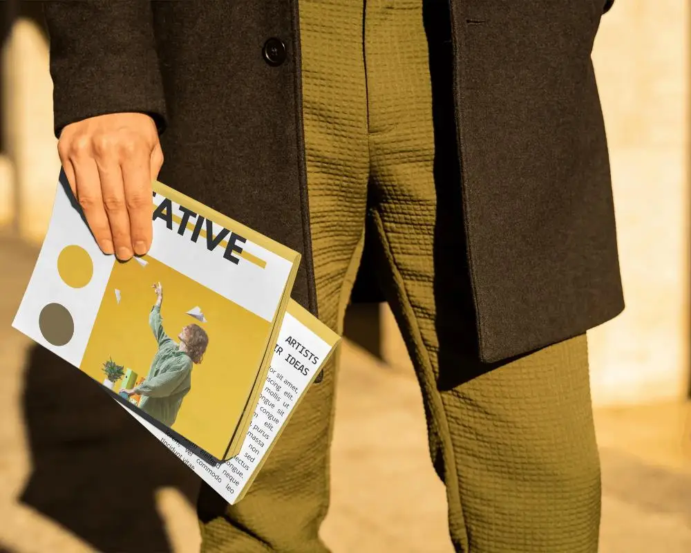 Hand Holding Folded Magazines Outdoor Fashion Style Streetwear Mockup Props Accessories