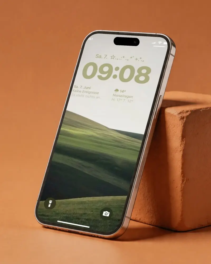Sleek Modern Iphone 17 Pro Mockup With Blank Screen Standing Against Textured Block Background