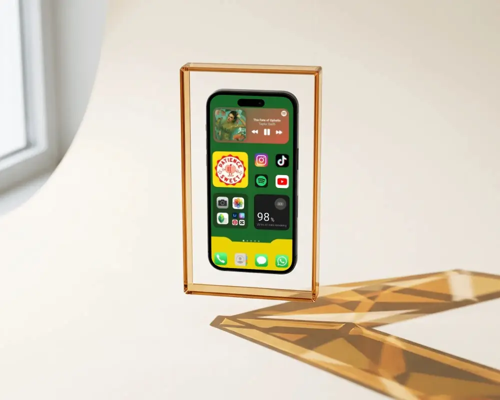 Sleek Iphone 15 Pro Mockup Suspended In Glass Frame With Subtle Light And Shadow Play