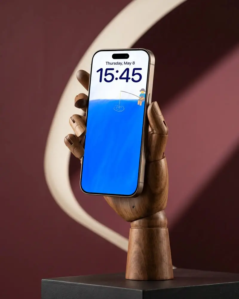Wooden Hand Holding Iphone 15 Pro Mockup For App Presentation And Digital Marketing Campaigns