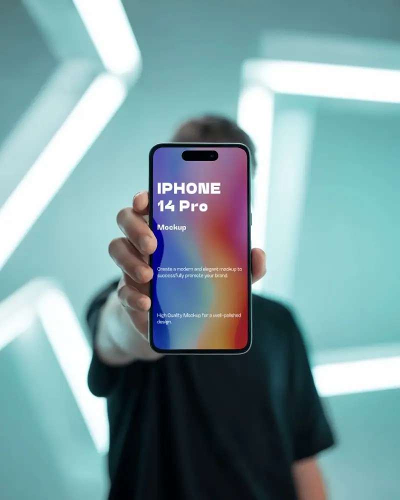 Person Holding Iphone 14 Pro Mockup Towards Camera Under Glowing Lights