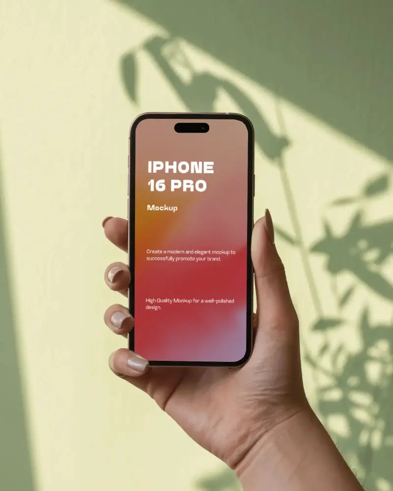 iphone-16-pro-mockup-handheld-with-botanical-shadows-on-soft-green-wall