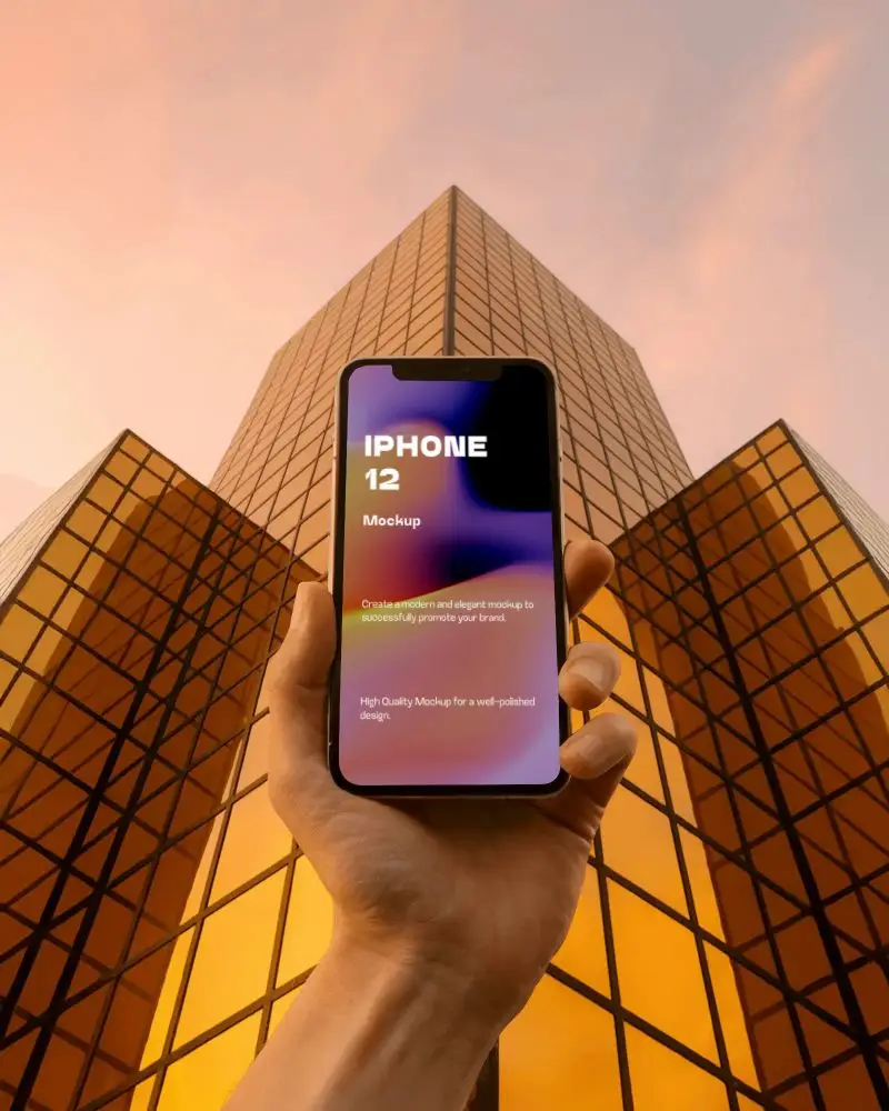 Iphone 12 Mockup Handheld Smartphone Against Golden Skyscraper Reflection At Sunset Skyline