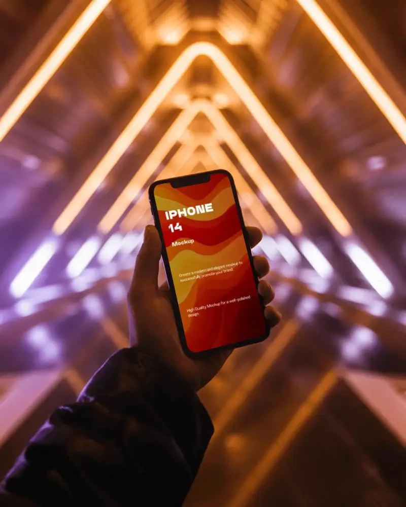 Sleek Iphone 14 Mockup Hand Display Against Glowing Neon Triangle Tunnel In Urban Digital Scene
