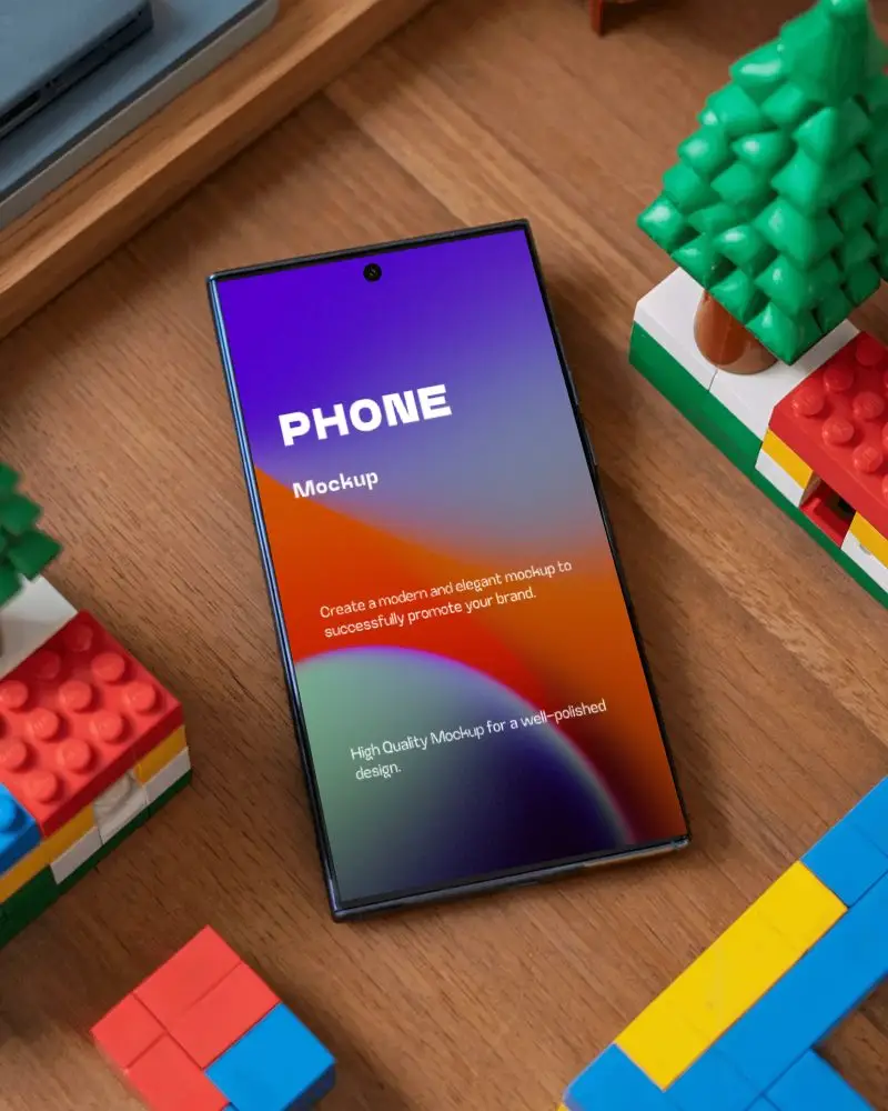 Samsung Sleek Phone Mockup With Blank Screen Surrounded By Toy Blocks On Wood