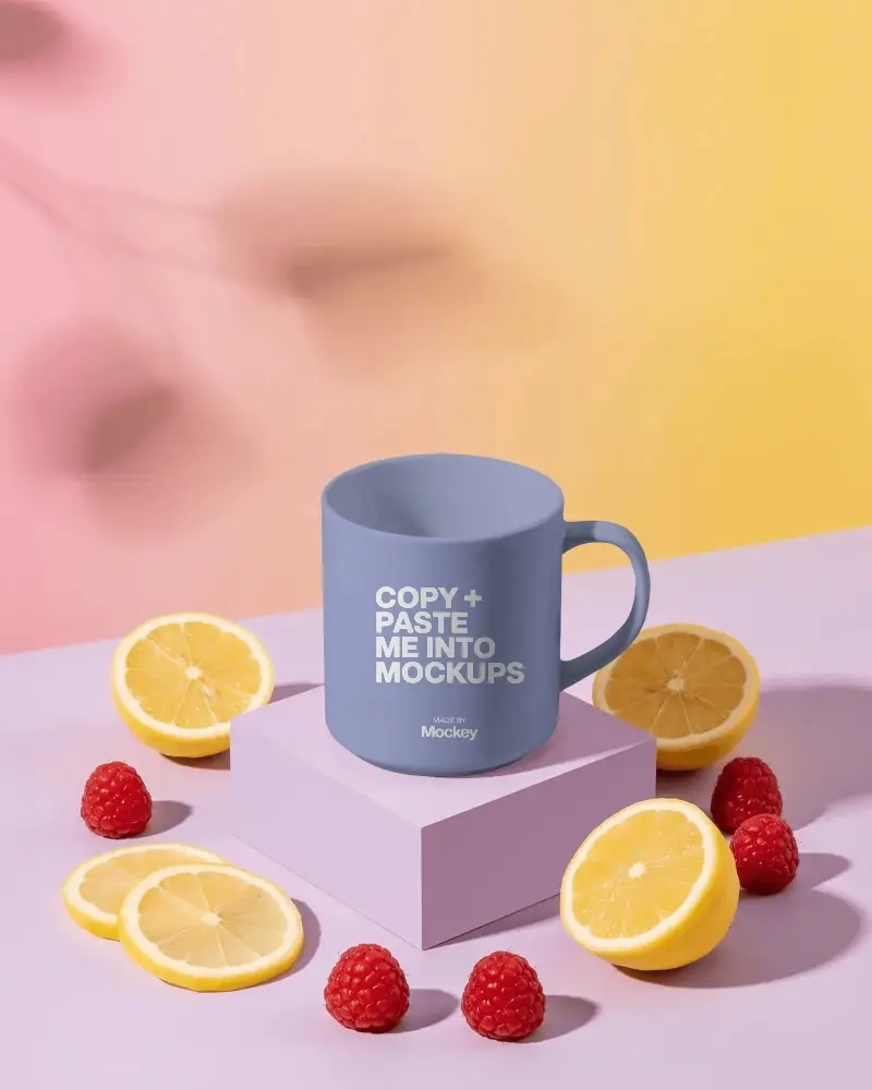 Minimalistic Coffee Mug Mockup With Lemon Slices And Raspberries On Pastel Background