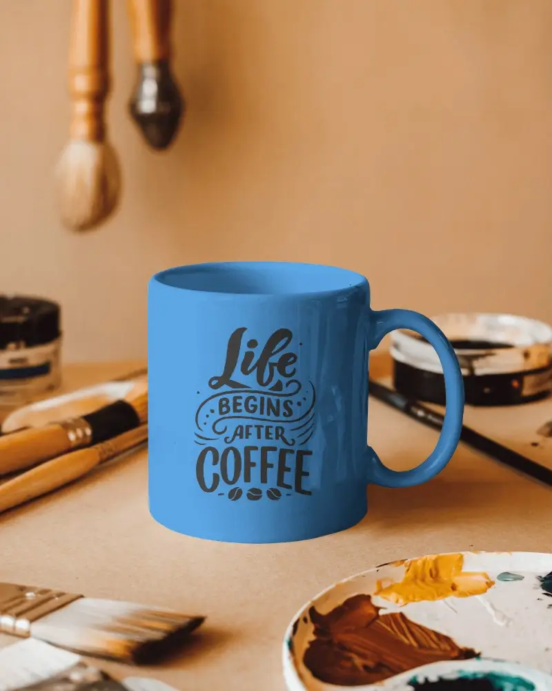 Creative Studio Mug Mockup White Coffee Cup With Design Space On Art Desk Accented By Paintbrushes And Colorful Palette Inspiring And Artistic Atmospherecreative Studio Mug Mockup White Coffee Cup With Design Space On Art Desk Accented By Paintbrushes And Colorful Palette Inspiring And Artistic Atmosphere