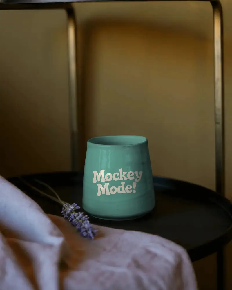 Ceramic Coffee Mug Mockup On Minimalist Black Tray With Soft Linen And Flower Decor