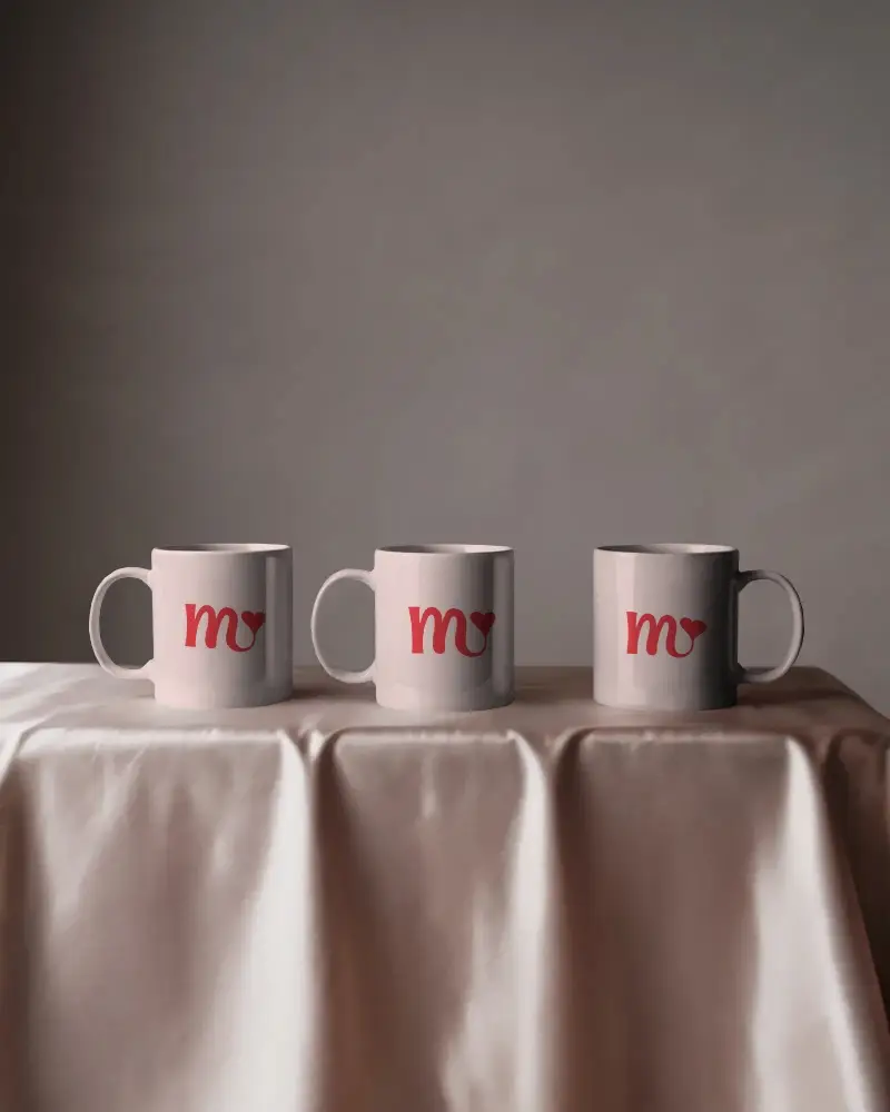 Three Set Ceramic Coffee Mug Mockup On Smooth Tablecloth For Professional Presentation