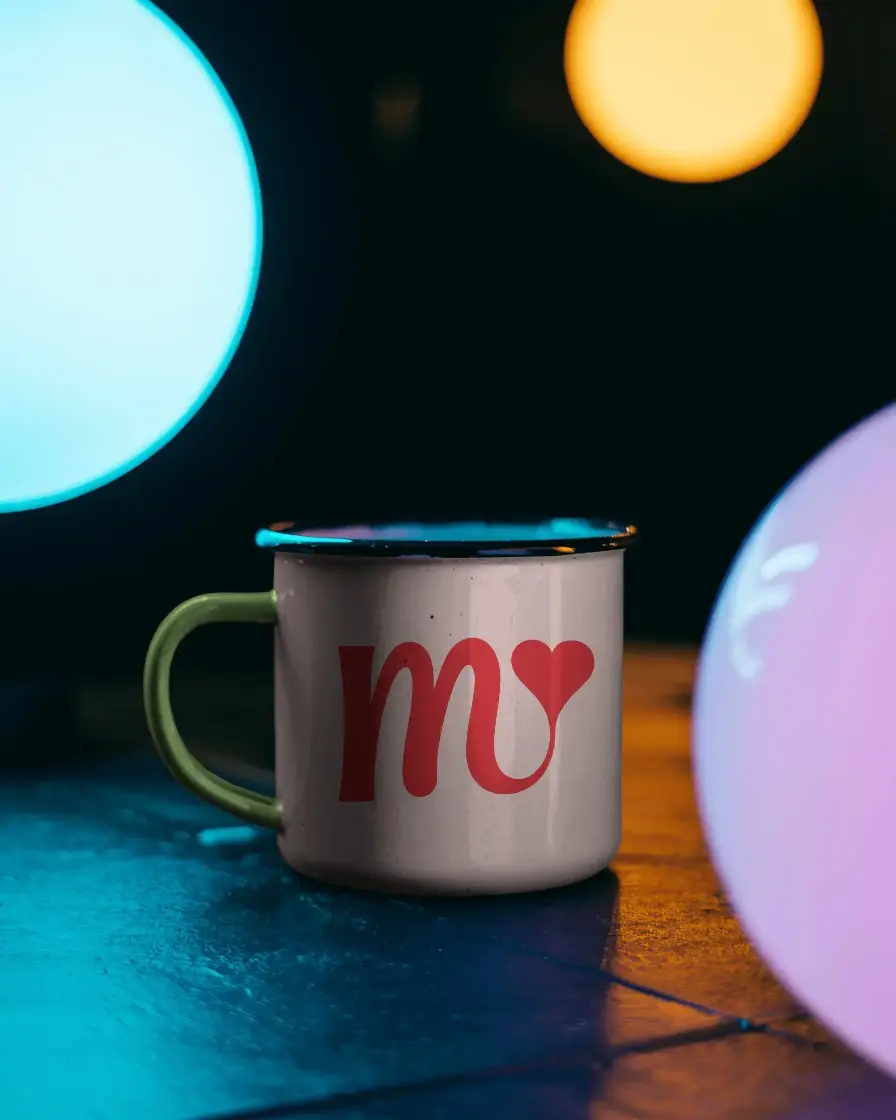 Stylish Metallic Mug Mockup With Handle Placed Among Glowing Spheres For Product Presentation