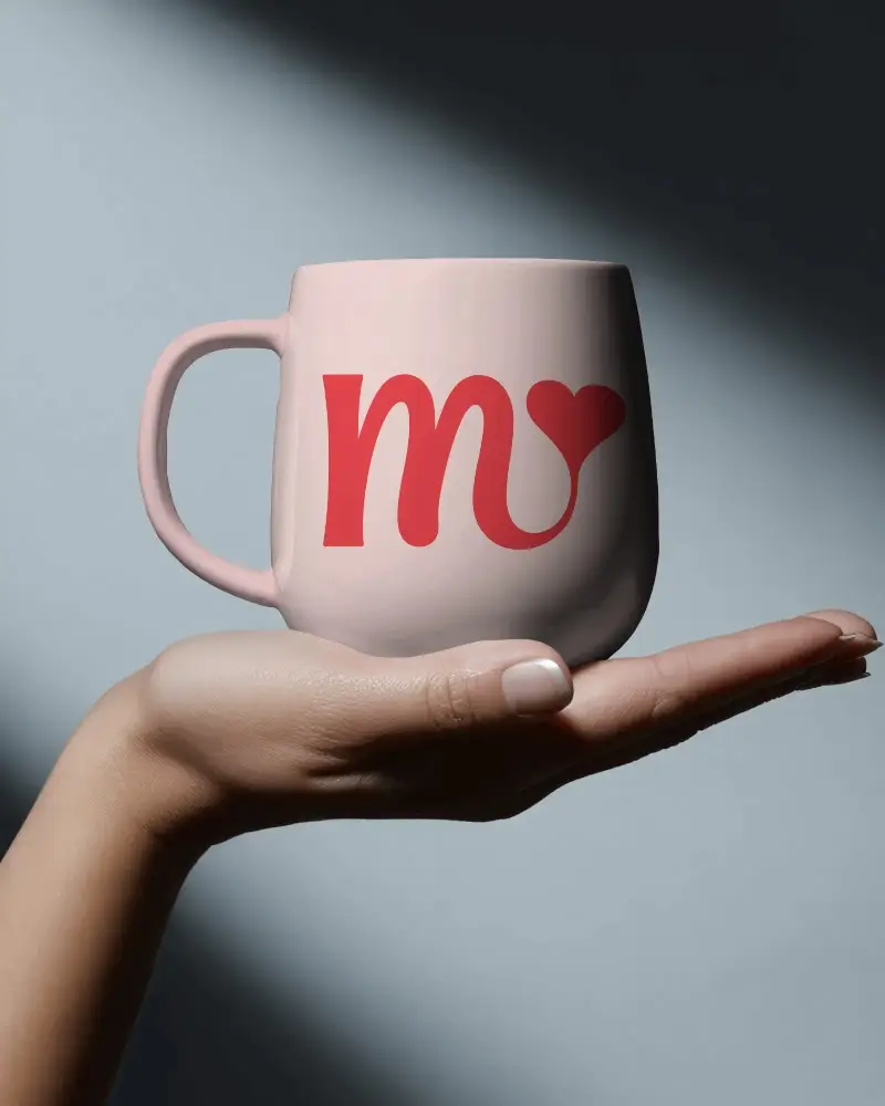 Elegant Minimalist Mug Mockup In Hand Showcasing Versatile Mockup For Product Promotion