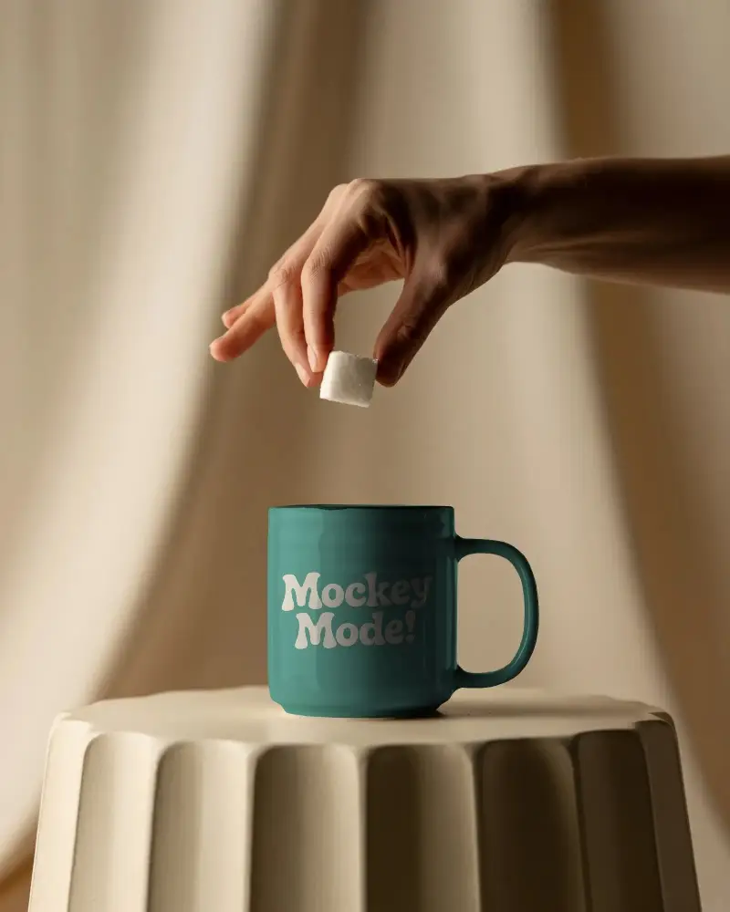 Ceramic Mug Mockup With Hand Adding Sugar Perfect For Beverage Brand Promotion