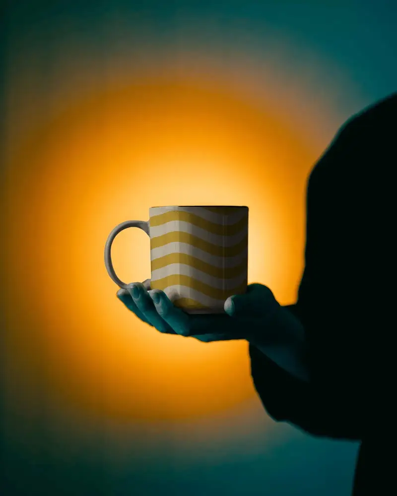 Hand Holding Simple Matte Mug Mockup For Custom Designs Or Branded Products