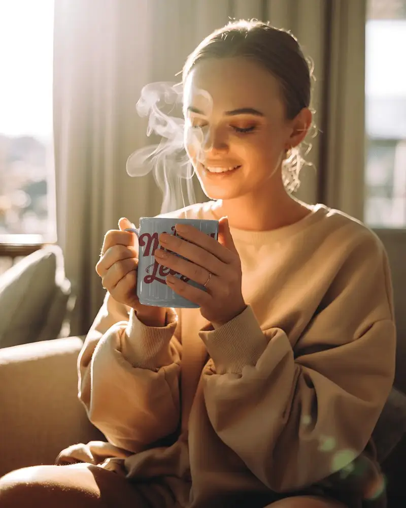 Woman Enjoying Hot Beverage In Cozy Sweater Holding Steaming Mug Mockup Comfort