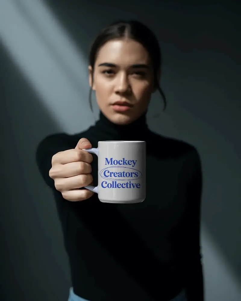 Female Model Showcasing Blank Coffee Mug Mockup For Branding Or Print Designs