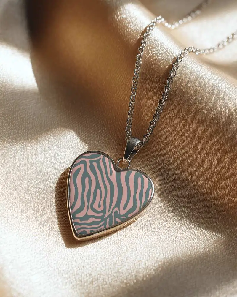 Delicate Heart Locket Necklace Mockup With Intricate Chain Laying On Smooth Textile