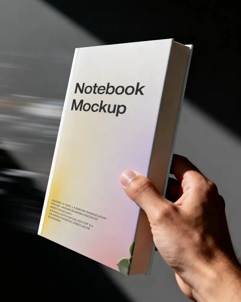 Hand Holding Hardcover Notebook Mockup For Personalized Journal Design Presentation