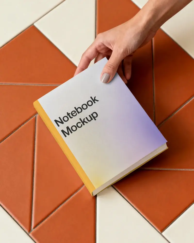 Hardcover Notebook Mockup Hand Holding Modern Geometric Tile Background Flatlay Design