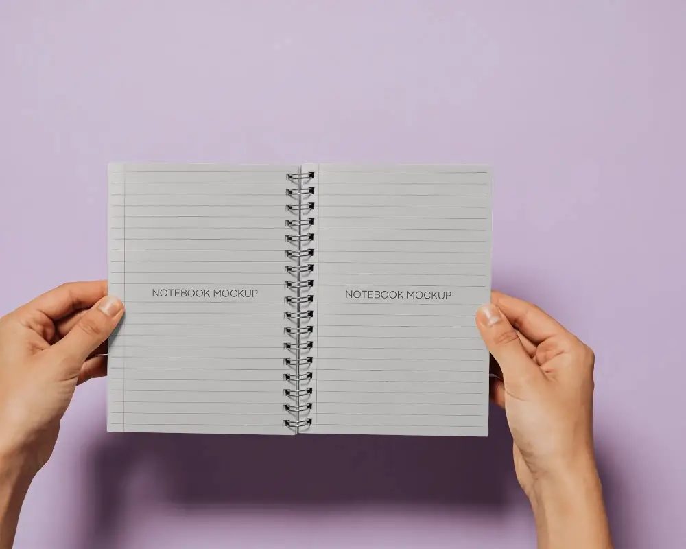 Open Spiral Bound Notebook Held For Showcasing Personalized Note Taking Or Sketching