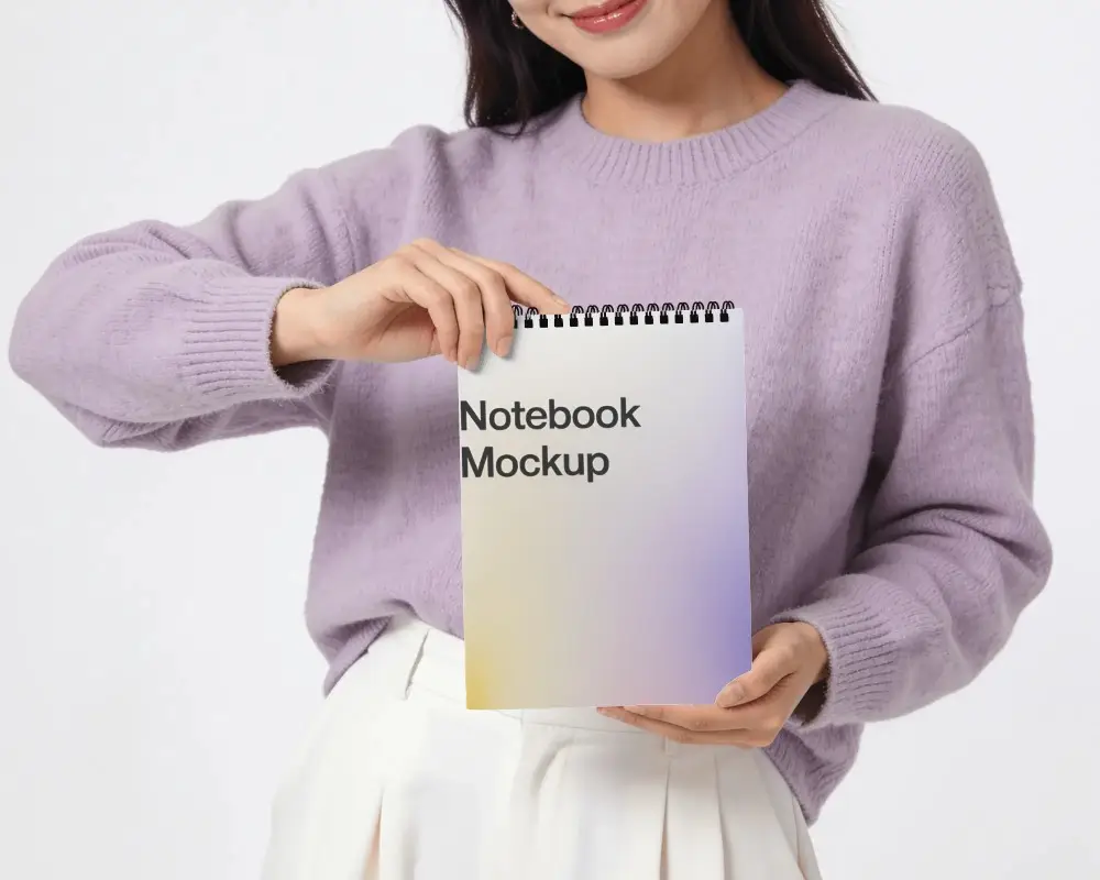 Vertical Spiral Notebook Mockup Presented Front Facing By Female Model With Two Hand Product Display