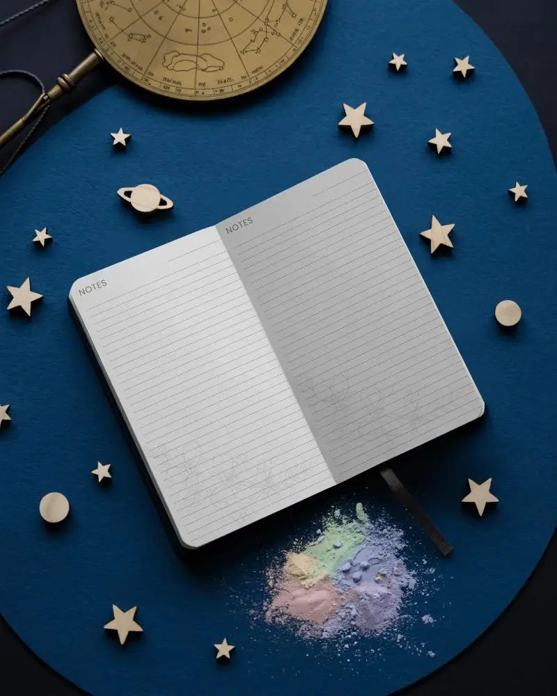 Cosmic Desk Open Notebook Mockup With Stars And Astrology Elements On Deep Blue