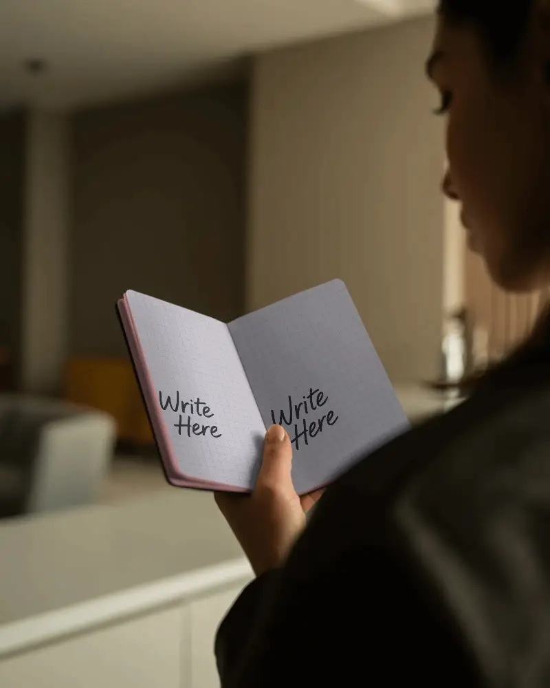 Person Holding Open Notebook Mockup For Minimalist Journal Design