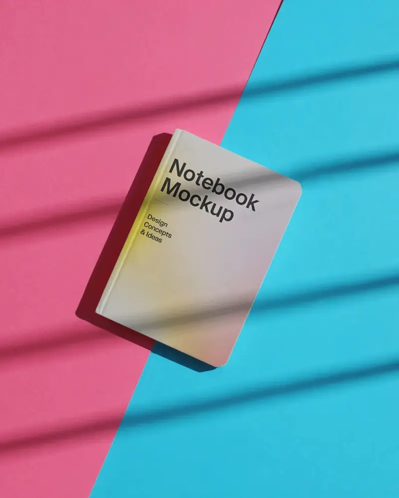Premium Notebook Mockup Floating On Contrasting Surface For Design Presentation