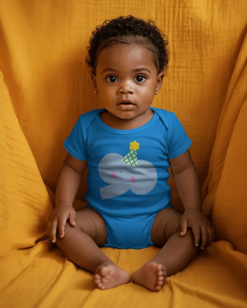 Studio Baby Onesie Mockup Infant Seated On Draped Fabric Warm Solid Backdrop