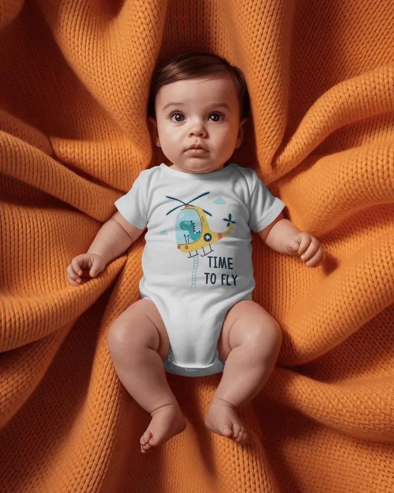 Flatlay Baby Onesie Mockup Infant Lying On Radial Knit Blanket Warm Texture
