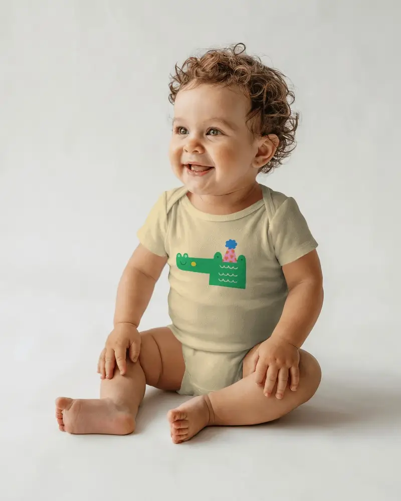 Happy Baby Onesie Mockup Sitting Toddler Looking Sideways Minimal Studio Lighting