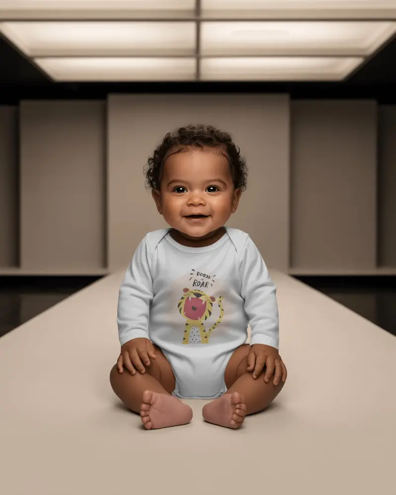 Baby Onesie Mockup Smiling Baby Sitting Center Stage Soft Studio Light Runway Style