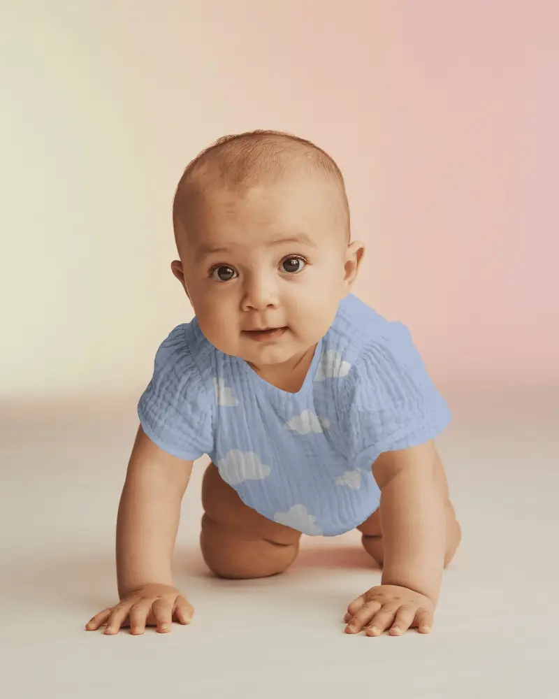 Baby Onesie Mockup Crawling Baby Front View On Soft Gradient Background With Natural Studio Light