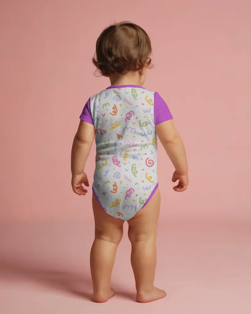 Cute Pastel Baby Onesie Mockup Back View Toddler Standing On Pink Studio Floor Soft Light Setup