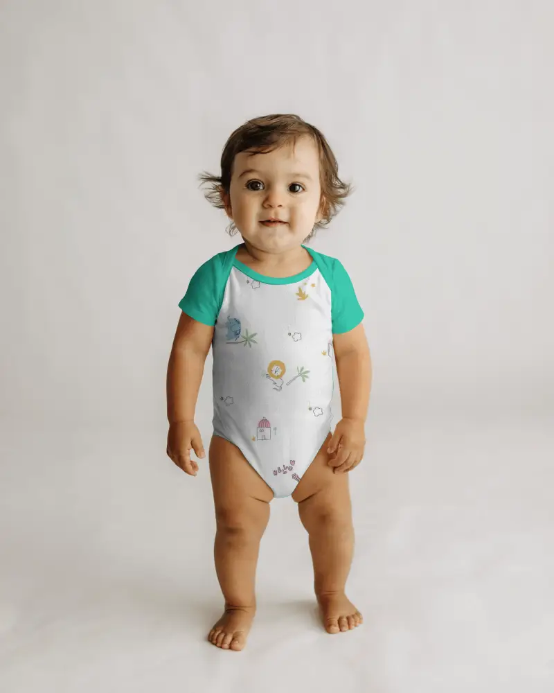 Smiling Toddler Baby Onesie Mockup Front View Standing On Clean Studio Floor Natural Light