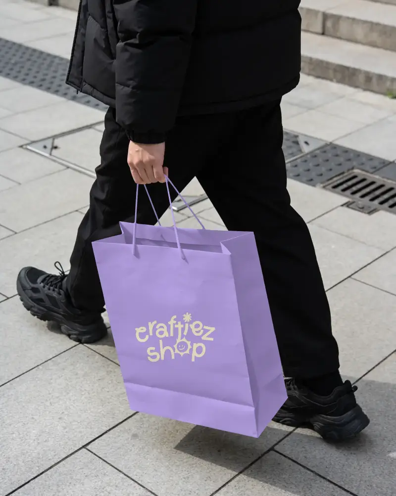 Person Holding Large Paper Bag Mockup Rope Handles On Urban Pedestrian Sidewalk Walking