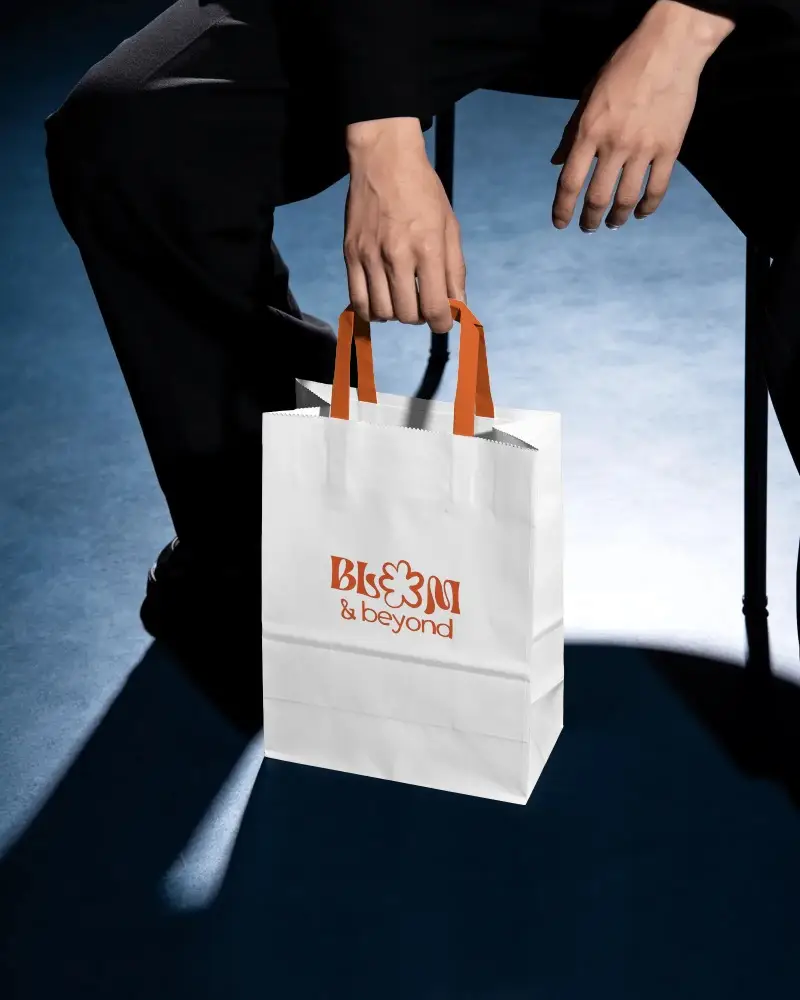 Eco Friendly Paper Bag Mockup With Handheld Grip For Branding And Packaging Design Showcase