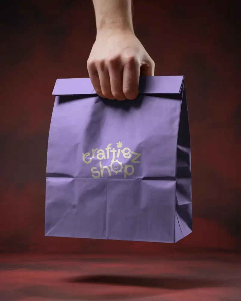 Hand Holding Plain Paper Bag Mockup For Customized Packaging Design And Branding Needs